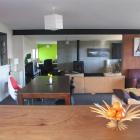 The open-plan kitchen and living area forms the hub of the home.
