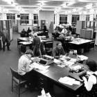 The 'Otago Daily Times' newsroom in 1977. Included are cartoonist Sid Scales (left, with...