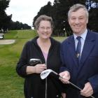 The outgoing president of Women's Goilf Otago, Glenys Rowley, and Alistair Hinsley, a member of...