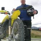 The president of the Wanaka Motorcycle Club, Andi Delis, with his 650cc Suzuki adventure...