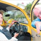 The Reverend Michael Kerr and his wife Ros inspect their fully refurbished 1964 Volkswagen Beetle...