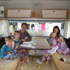 The Soper family, of Te Anau, are having their first stay at the St Bathans Domain. Getting ready...