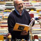 The Star Regent 24-hour Book Sale convener Doug Lovell enjoys browsing through a selection of...