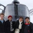 The stranded tourists pose for a photograph on the Lammerlaw Range. Photo courtesy of One News.