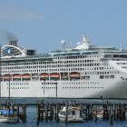 The Sun Princess arrives and passengers disembark at Port Chalmers yesterday. Photos by Peter...
