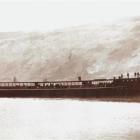 The TSS <i>Earnslaw</i> hull cruises on Lake Wakatipu in 1912 on its way to Queenstown.  The hull...