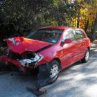 The two cars involved in yesterday's crash at Arrow Junction. The driver of the Ford at left was...