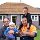 The Vahua family outside their Sunnyvale home, (from left) Sara, Hamuera (7 months), Io and Kepha...