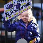 Third-generation playcentre child Laura Allison (5) shows her support for the early childhood...