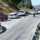 This head-on collision yesterday at the single-lane Albert Town bridge over the Clutha River,...