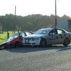 This  Mitsubishi Mirage ground to a halt in a ditch on Kaka Point Rd yesterday after being...