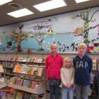 This mural of Oamaru birds which (from left) Chloe (10), Zara (5) and Harry (11) Wilson and...