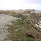 This portion of the coast road south of Oamaru along Beach Rd (to the right) has already been...