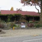 This two-bedroom cottage at Wanaka, with prime lake views, sold at auction for $1.1 million at...