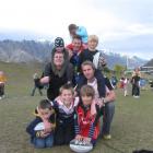 Three  former prominent  rugby players and their children at Remarkables Primary School in...