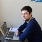 Tim Tait tests code he developed for a dating website. The Dunedin man works for a UK company...