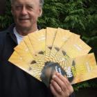 New Zealand Gold Guitar Awards convener Phil Geary with the newly printed programmes for the event.