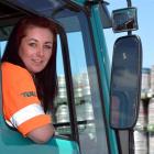 Toll truck driver Amy Perkins in a Volvo truck at the Dunedin depot. Photo by Stephen Jaquiery.