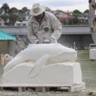 Tongan artist Silivenusi Funaki, of Oamaru, wastes no time on the first day of the Oamaru Stone...