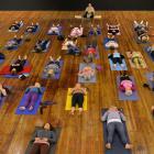 Emmy Award-winning singer/songwriter Toni Childs conducts a yoga session in  the Dunedin Town...