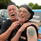 Tony and Heather Cummings, who sports a tattoo of a Speight’s logo, with their fleet of Barbecue...