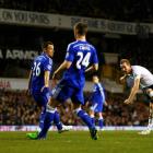 Tottenham Hotspur's Harry Kane (R) shoots to score against Chelsea during their English Premier...