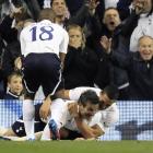 Tottenham Hotspur's Ryan Nelsen (C) celebrates his goal against Bolton Wanderers with Jake...