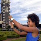 Tourists like Yurani Heijnen (21), of Utrecht, Holland, pictured last night, will continue to...