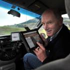 TracMap managing director and founder Colin Brown uses an iPad to monitor jobs  in the field....