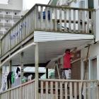 Tradesman Michael Kinraid carries out work on  a balcony in Union St East yesterday at the...