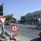 Traffic negotiates the Thames-Eden Sts intersection yesterday as contractors prepare it for the...