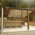 Trampers have a new undercover gas-supplied rest stop at the Routeburn Flats Hut, courtesy of the...