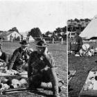Troopers line up with their kits for inspection at Tahuna Park camp. The soldier at right had the...