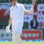 Trott celebrates his 50 on day 5.