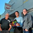 Tuapeka Gold Print director Jim Robertson (left), general manager Greg Jolly (centre)  and...