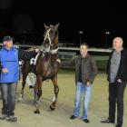 Tumundal with trainer Graeme Anderson (left) and owners Peter Soper (centre) and Tony Gow, after...