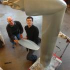 Power house wind designers, Bill Currie, left and Wayne O'Hara with the dismantled wind turbine...