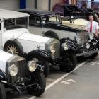 Turners Auctions Dunedin branch manager Andrew Spiers with a row of vintage Rolls-Royce cars,...