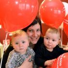 Twin girls Eliza (left) and Gemma visit the Dunedin donor centre yesterday with their mother,...