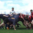 Two invercargill teams, from left,  the Invercargill Blues and Waikiwi Rugby, meet head-on in the...