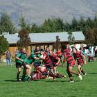 Tyne Schofield on the run against Alexandra in Arrowtown's 16-11 win against Alexandra. Photos by...