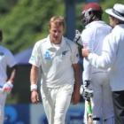 Umpire Nigel Llong intervenes as New Zealand bowler Neil Wagner confronts West Indies batsman...