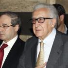UN envoy Lakhdar Brahimi (C) returns to a hotel after meeting Syria's President Bashar al-Assad...