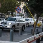 UN vehicles transporting chemical weapons experts return to their hotel in Damascus. REUTERS...