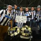 United fans John Alder and Liam Sweeney at Forsyth Barr Stadium last night are (from left) Devin...