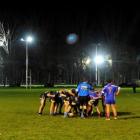 University and Harbour Seals players do battle under lights at Logan Park during a club rugby...