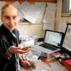University of Otago geologist Dr Virginia Toy examines rock fragments recovered from 700m below...