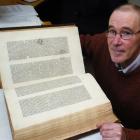 University of Otago special collections librarian Dr Donald Kerr with the inky cat paw prints...