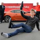 University of Otago student Michael Callander with his new shoes yesterday, the footwear he...