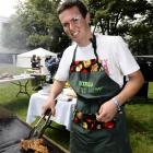 University of Otago student Nic Christie (18) cooks some chicken after a "road kill" cooking...